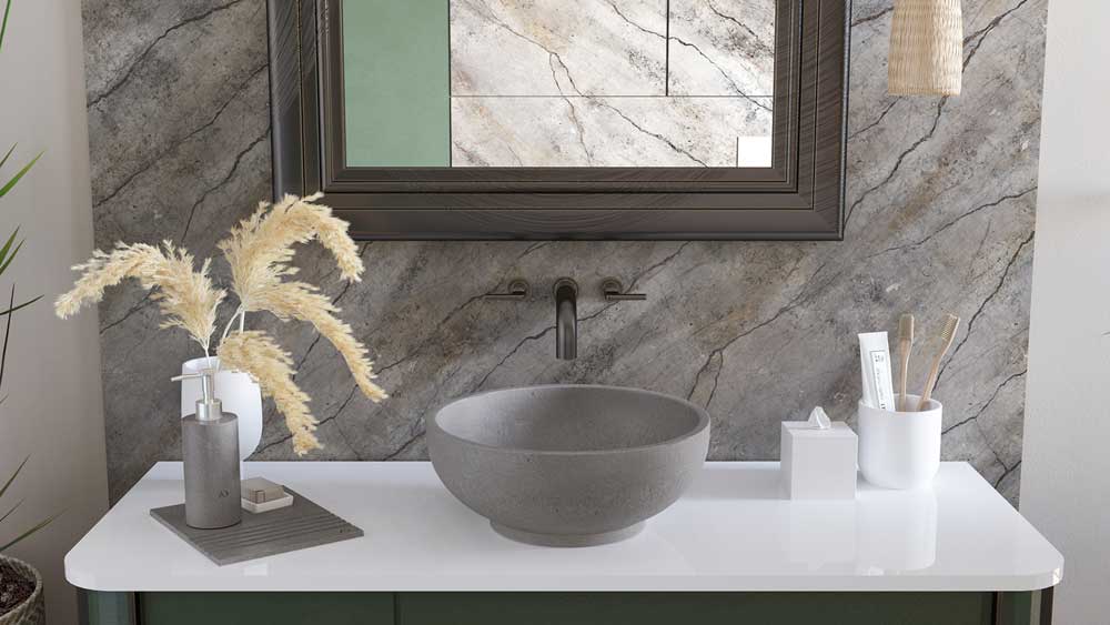 umywalka z szarego marmuru na planie koła z ckołem, szara umywalka z kamienia naturalnego, marmurowa ergonomiczna umywalka